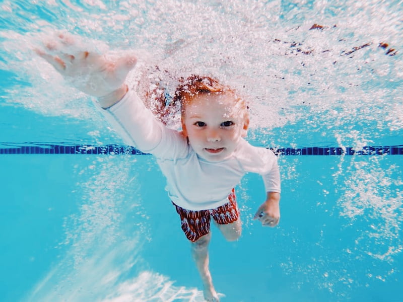 Kids swimming: a step-by-step guide on how to teach them